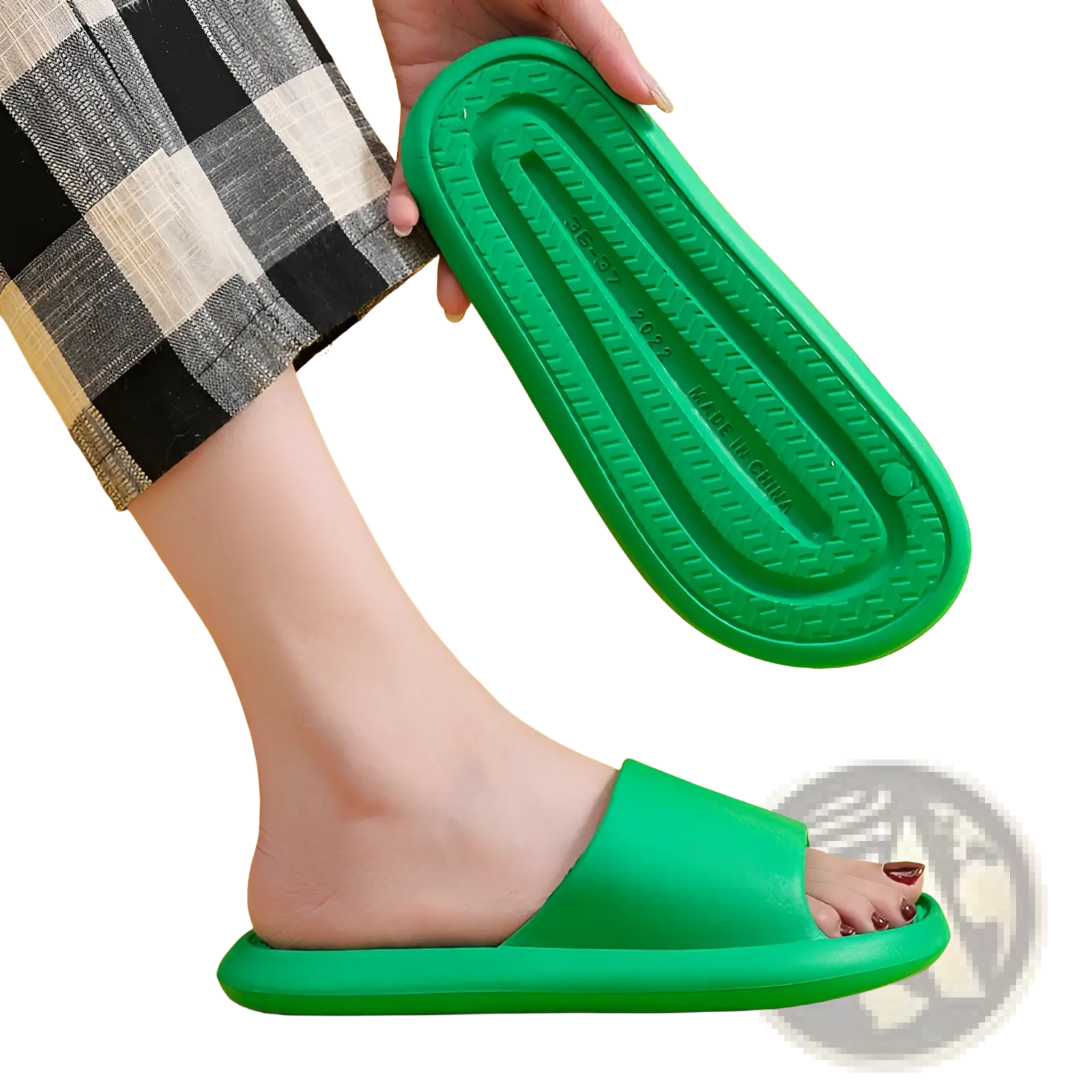 Bright green massage slippers honeycomb textured rubber slides with a textured sole and simple open toe design