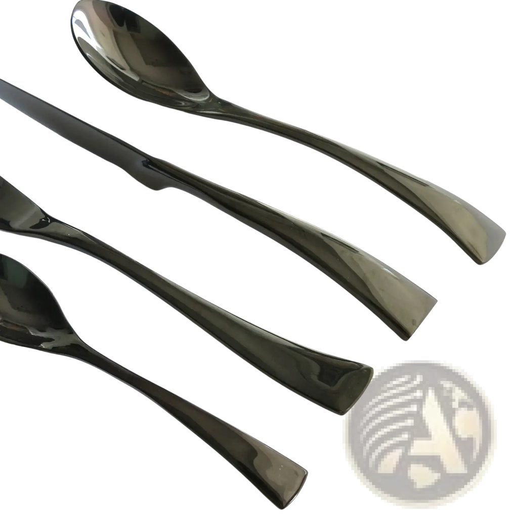 Set of sleek black stainless steel cutlery with modern tapered handles in a matte black flatware set 24pcs
