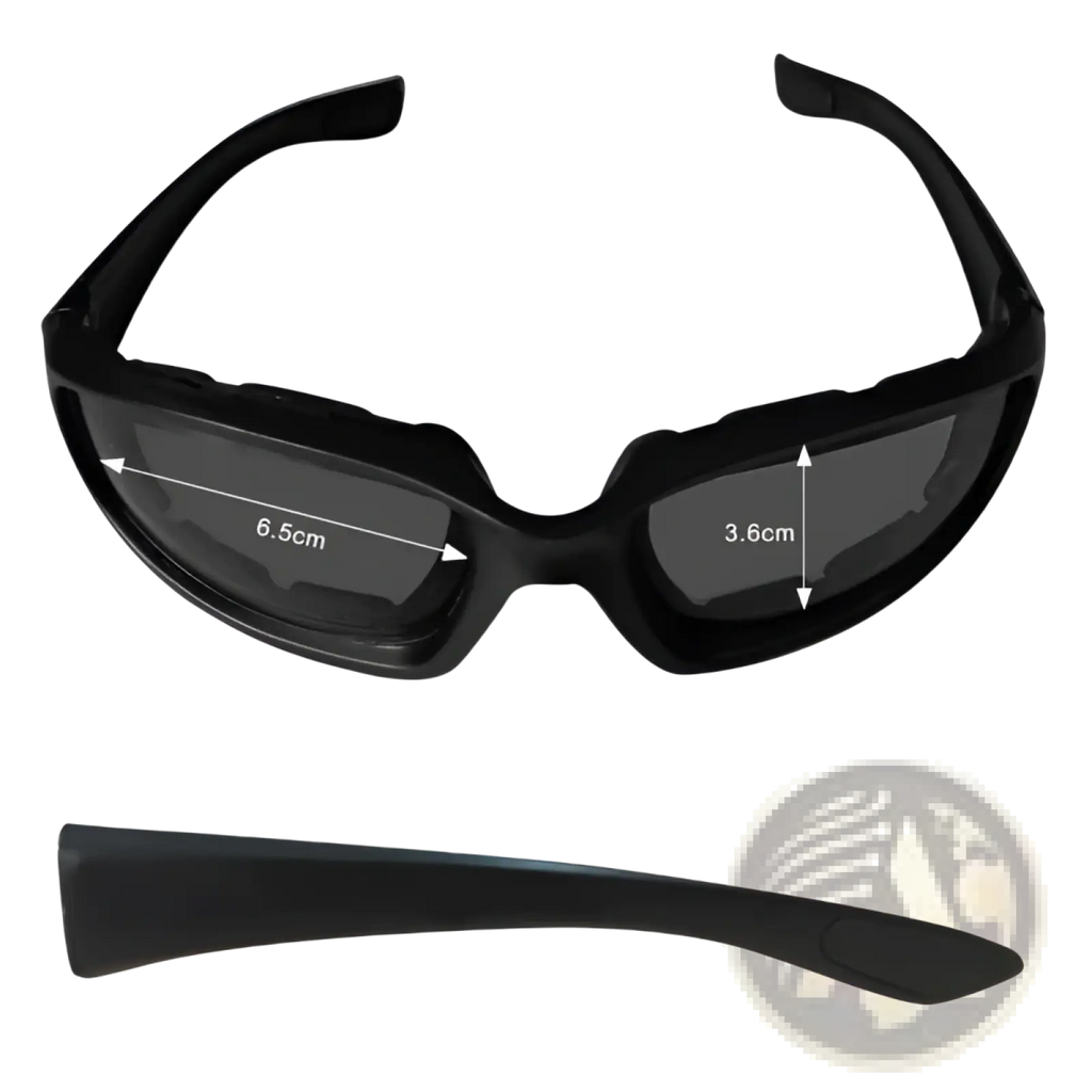 Matte black wind resistant motorcycle riding goggles made of black plastic with dark gray lenses and a rugged design