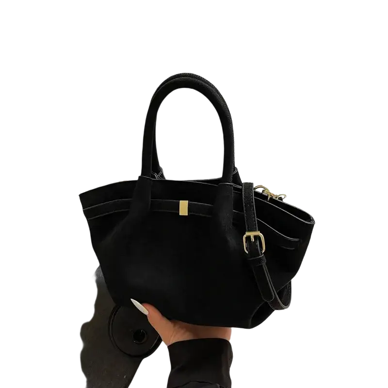 Black suede-like matte leather crossbody bag with gold-tone hardware and shoulder strap for versatile use