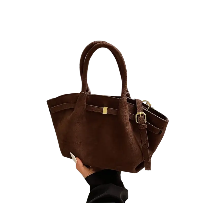 Matte brown suede crossbody bag with gold-tone hardware and shoulder strap for versatile use