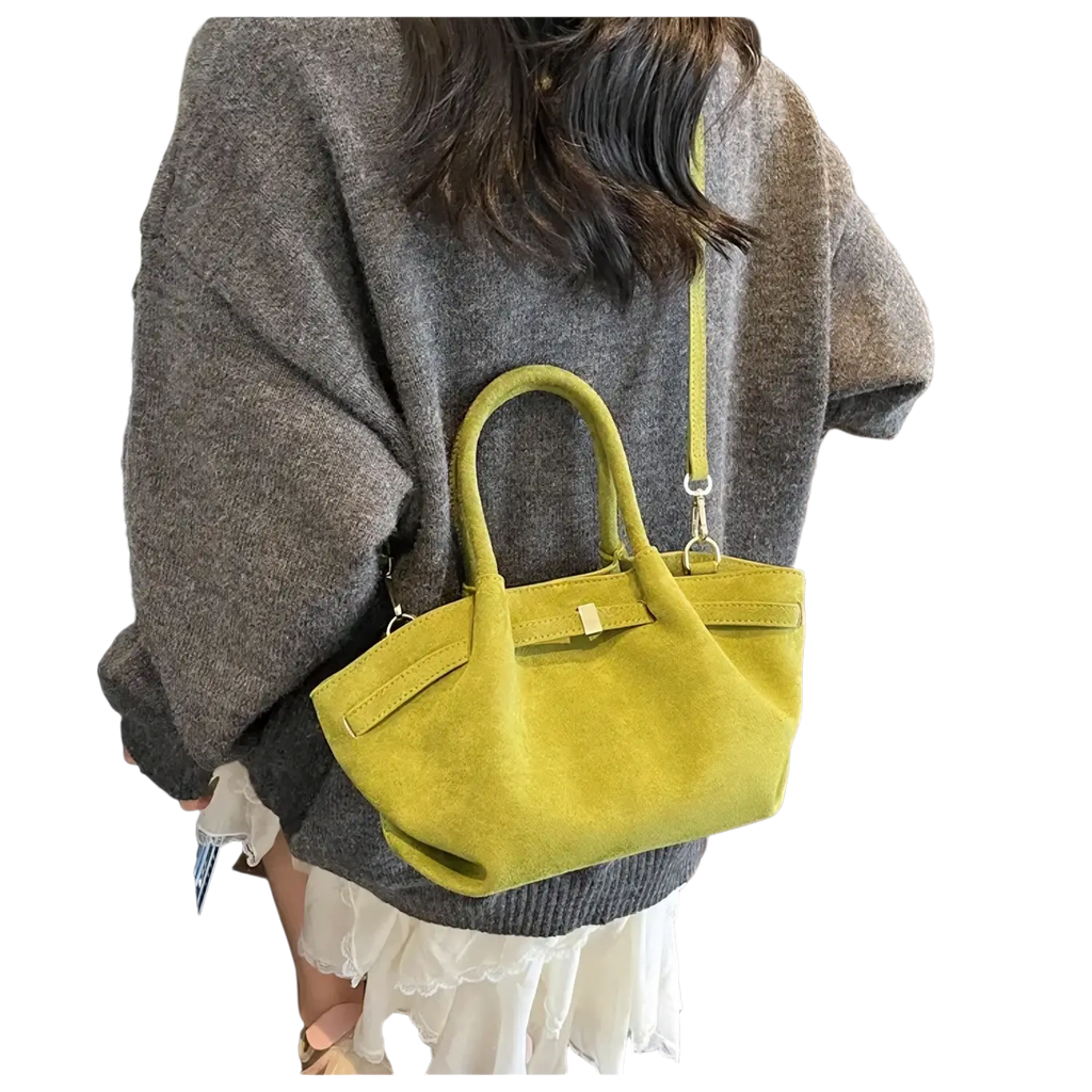 A vibrant lime green suede matte leather crossbody bag with a structured top handle and matching shoulder strap