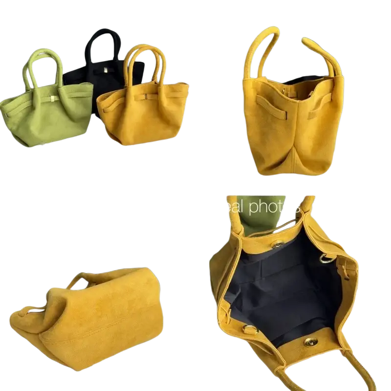 Yellow suede tote bag with structured handles and contrasting black interior designed for use with shoulder strap crossbody bags