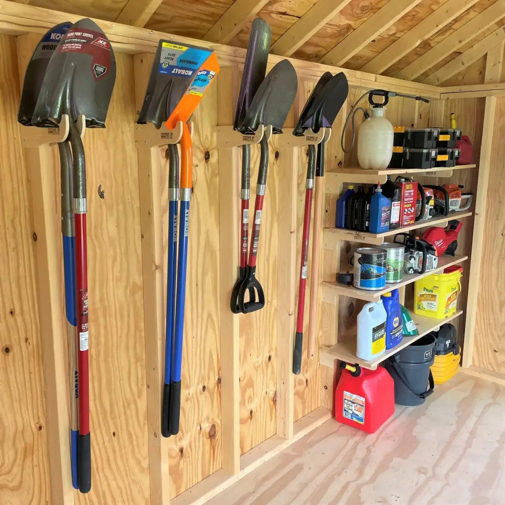 Max Birch plywood stud mounted shed organization kit with red and blue handled shovel with black metal blade