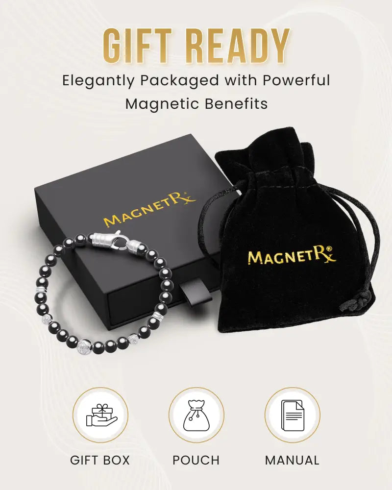 Black and silver magnetic hematite armory skull bracelet with spherical beads displayed with gift box and velvet pouch