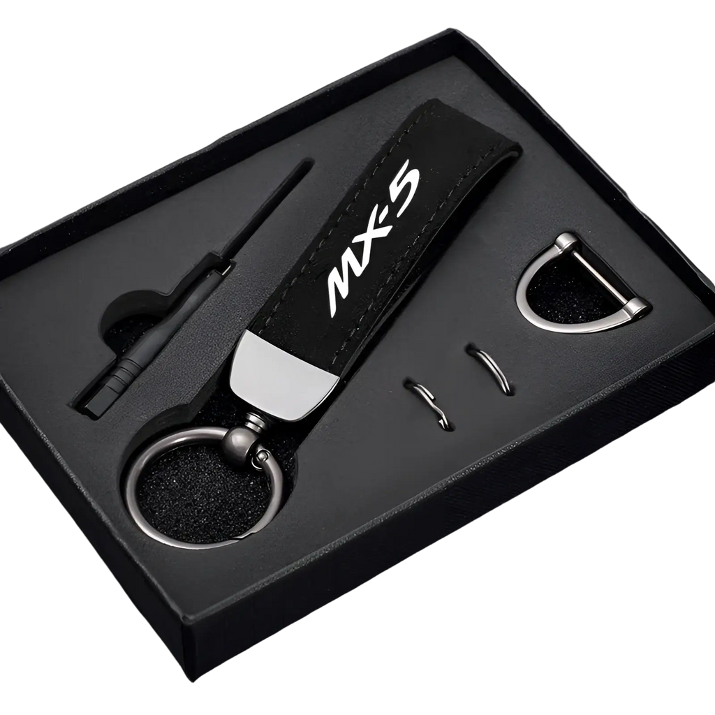 Black leather Mazda mx5 keychain with silver logo and metallic hardware for car key ring holding