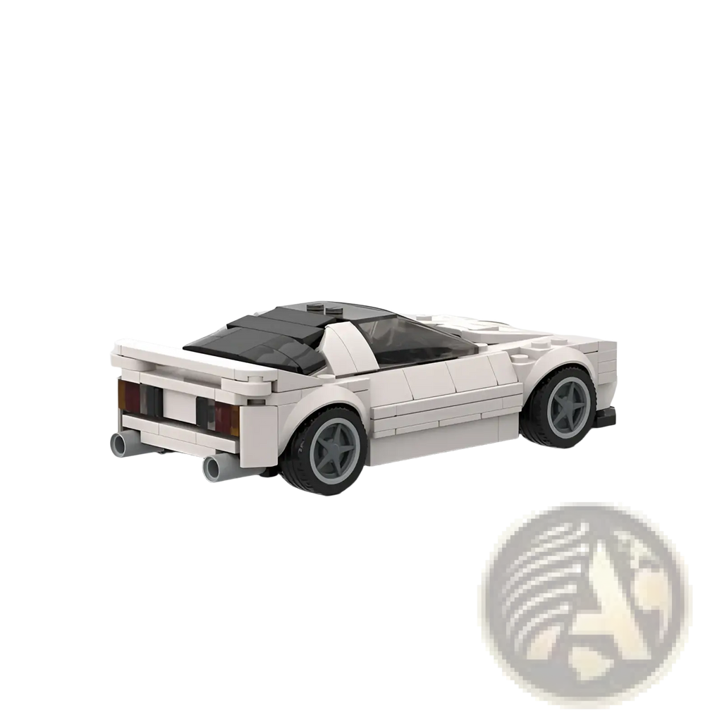 White lego-built mazda rx7 fc3s sports car with black roof detailed gray wheels and exhaust pipes shown from the back