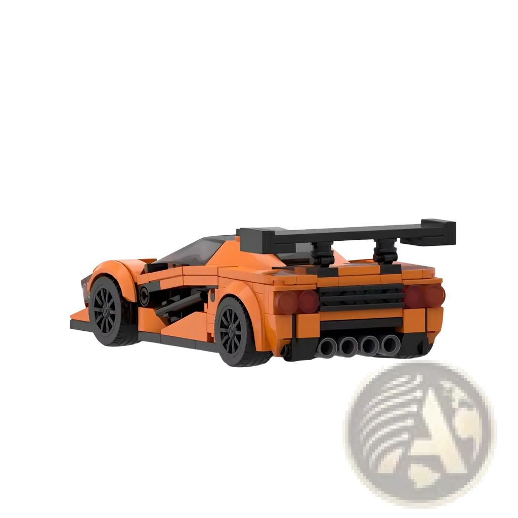 Orange and black lego mclaren f1 gtr race car model showing rear side with spoiler and detailed exhaust system