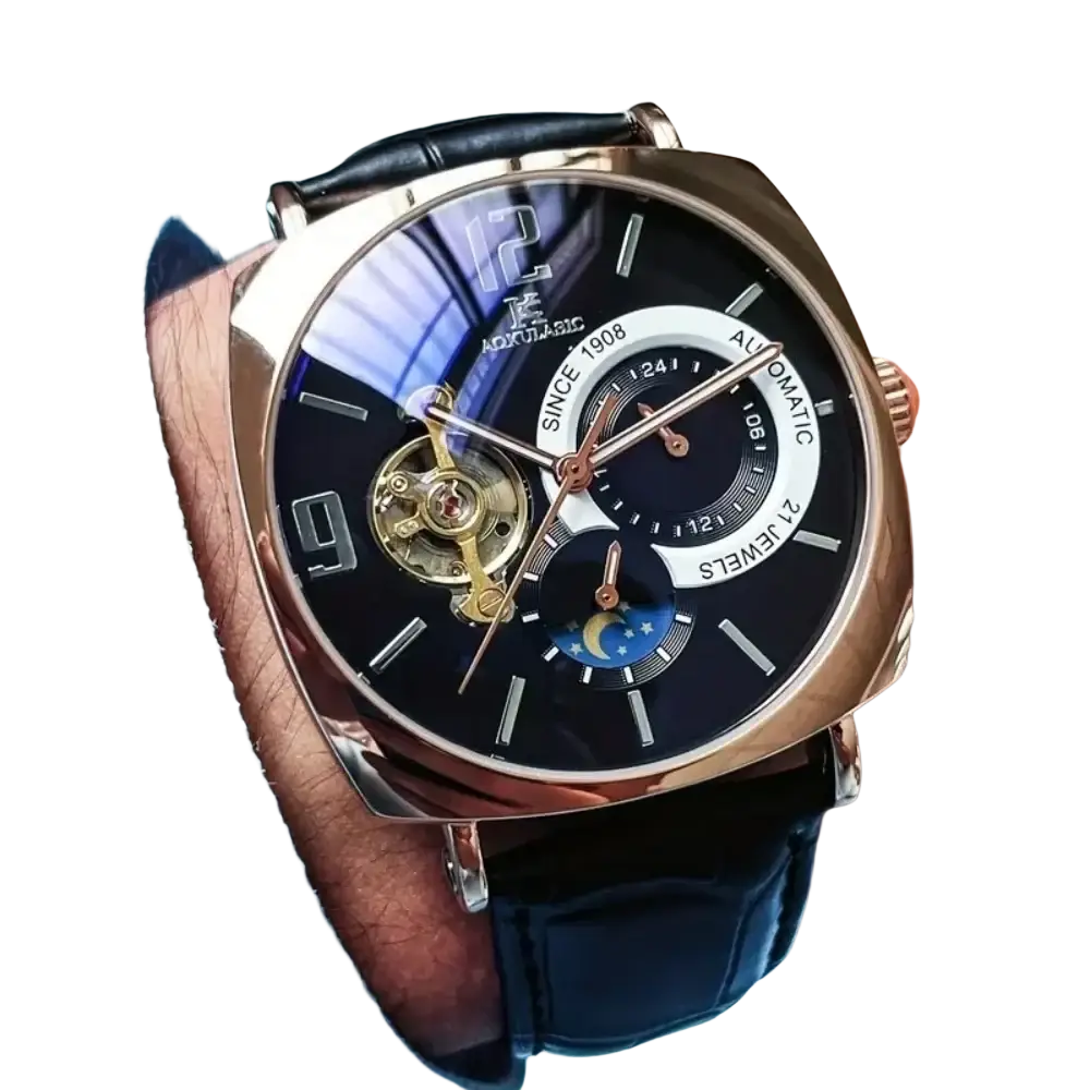 Rose gold-toned mechanical skeleton watch automatic with black dial exposed movement and moon phase display leather strap