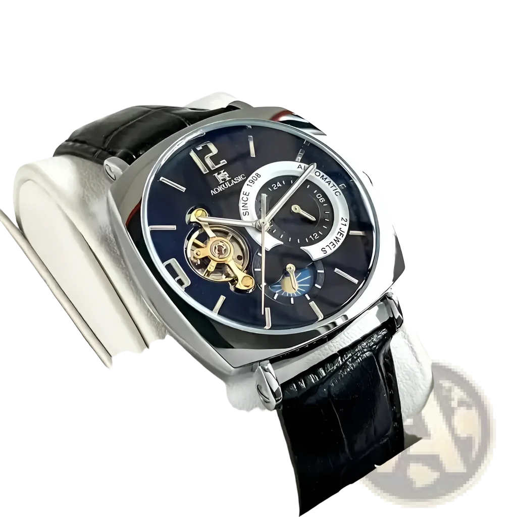 Silver-toned mechanical skeleton watch automatic with dark blue dial black leather strap and visible gold-tone gears