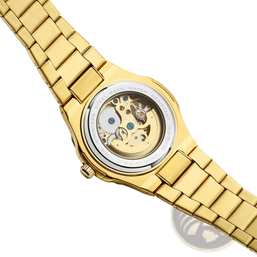 Mechanical skeleton watch stainless steel automatic gold with exposed gears and polished gold-toned link bracelet