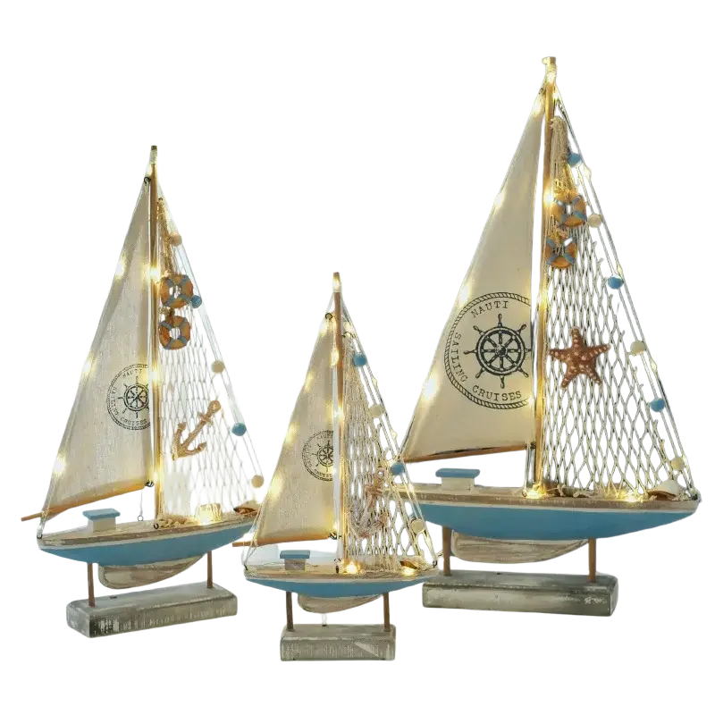 Mediterranean style wooden led sailing boat home decor featuring three blue hull sailboat models with cream sails and lights
