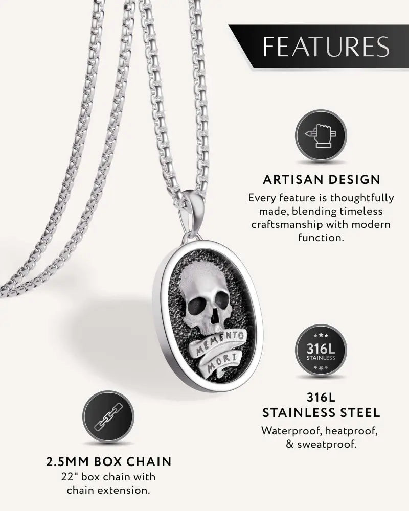 Silver oval stainless steel memento mori skull pendant necklace with detailed design on matching box chain