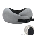 Gray memory foam travel neck pillow with black mesh and adjustable strap for customizable support during travel