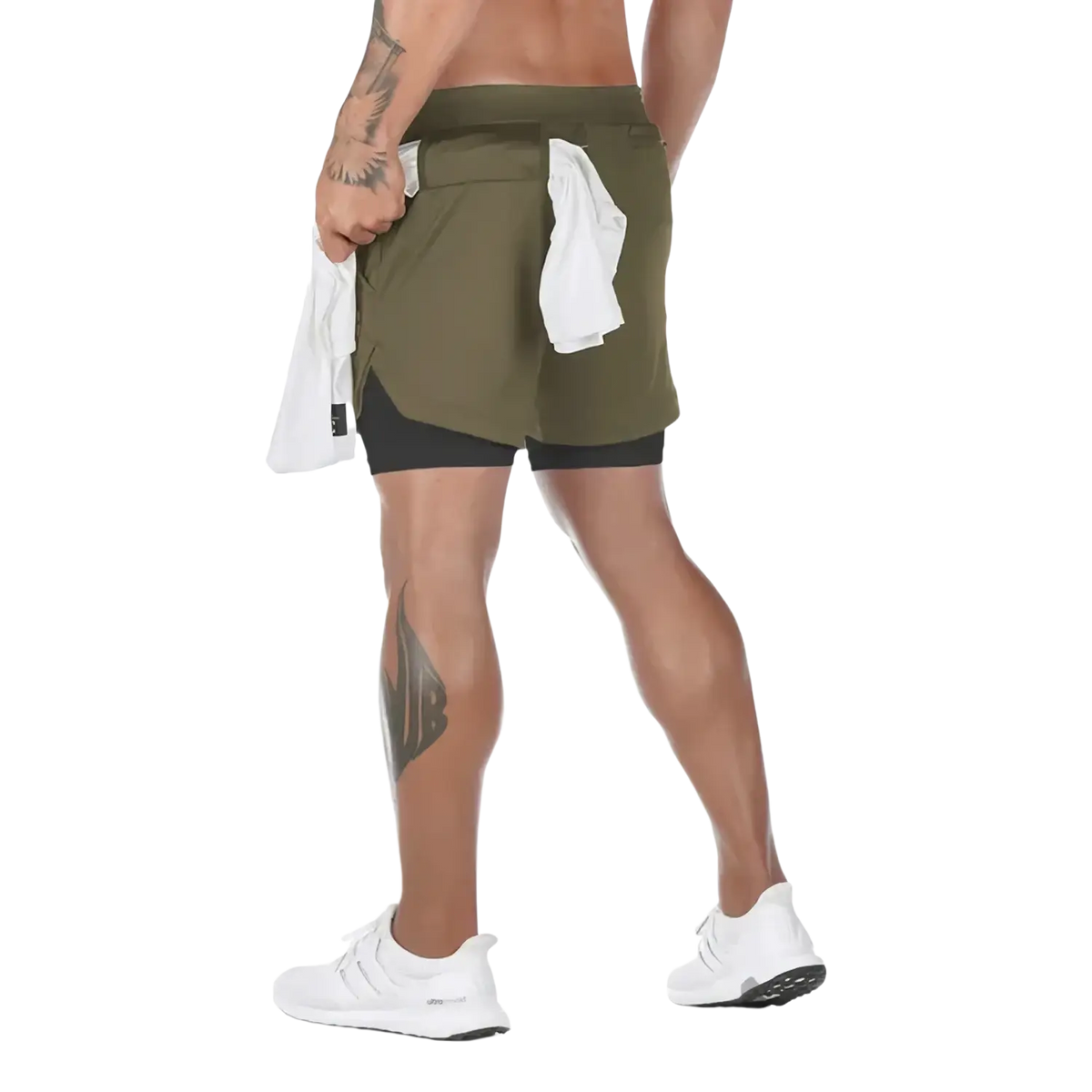 Olive green two-layer quick dry gym shorts for men with black inner layer and white towel in back pocket shown from back side