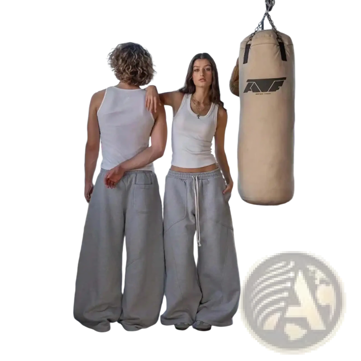 Beige canvas punching bag with black logo and reinforced straps designed for men baggy cargo sweatpants high street joggers