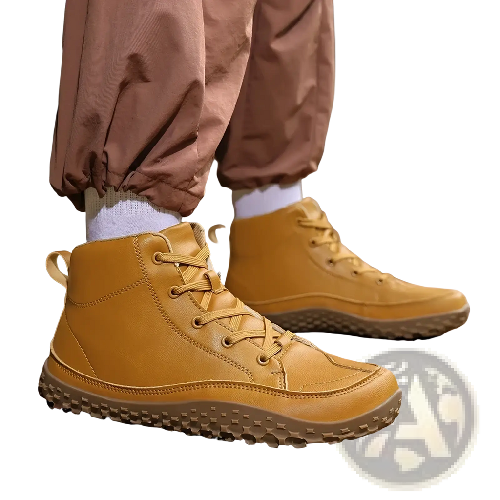 Mustard-yellow men barefoot hiking boots in leather with zero drop and textured rubber sole for outdoor use