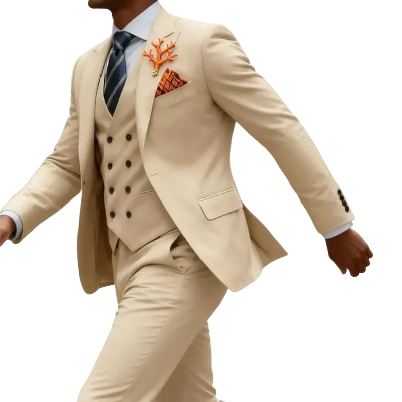 Men beige three piece double breasted suit with matching vest and trousers accented by navy striped tie and coral brooch