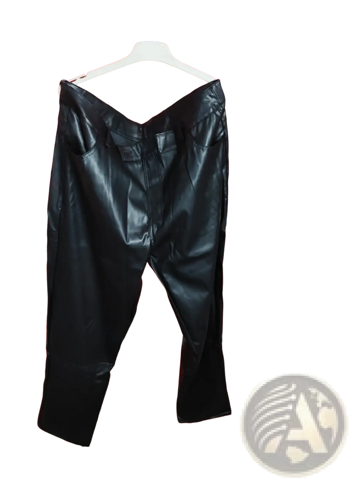 Men black faux leather pants with a high waist and flared legs hanging on a white hanger in slim fit style