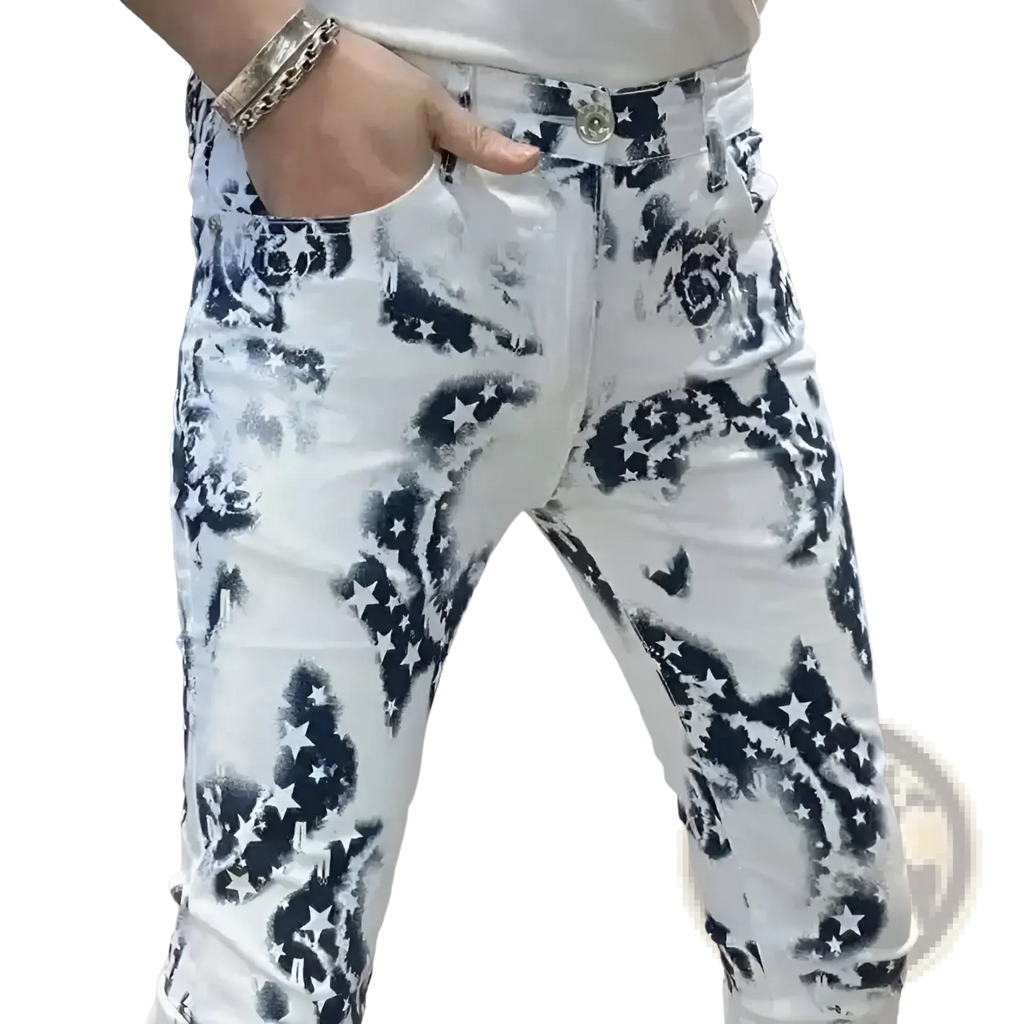 Men black floral slim fit jeans in white denim with bold black star and floral spray-paint pattern on front side