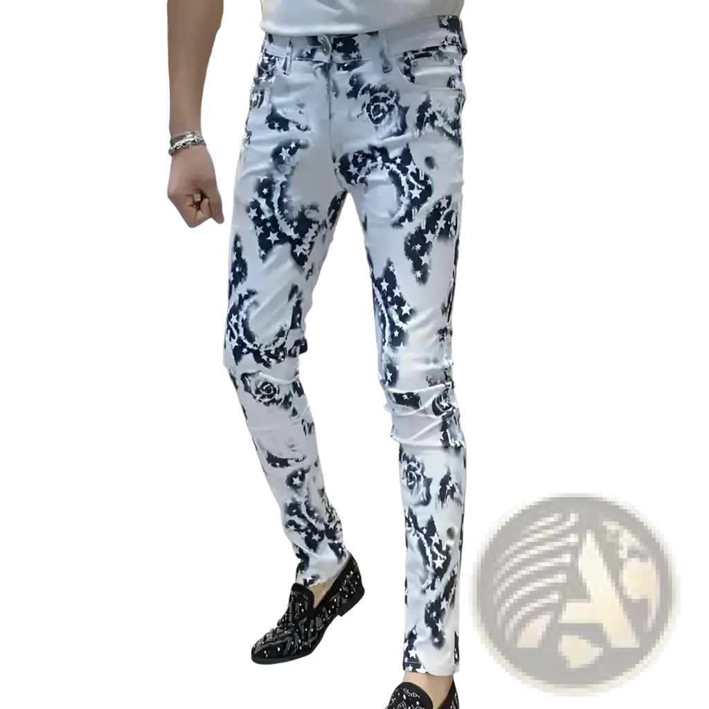 Men black floral slim fit jeans in white denim featuring a bold black floral pattern on the front side