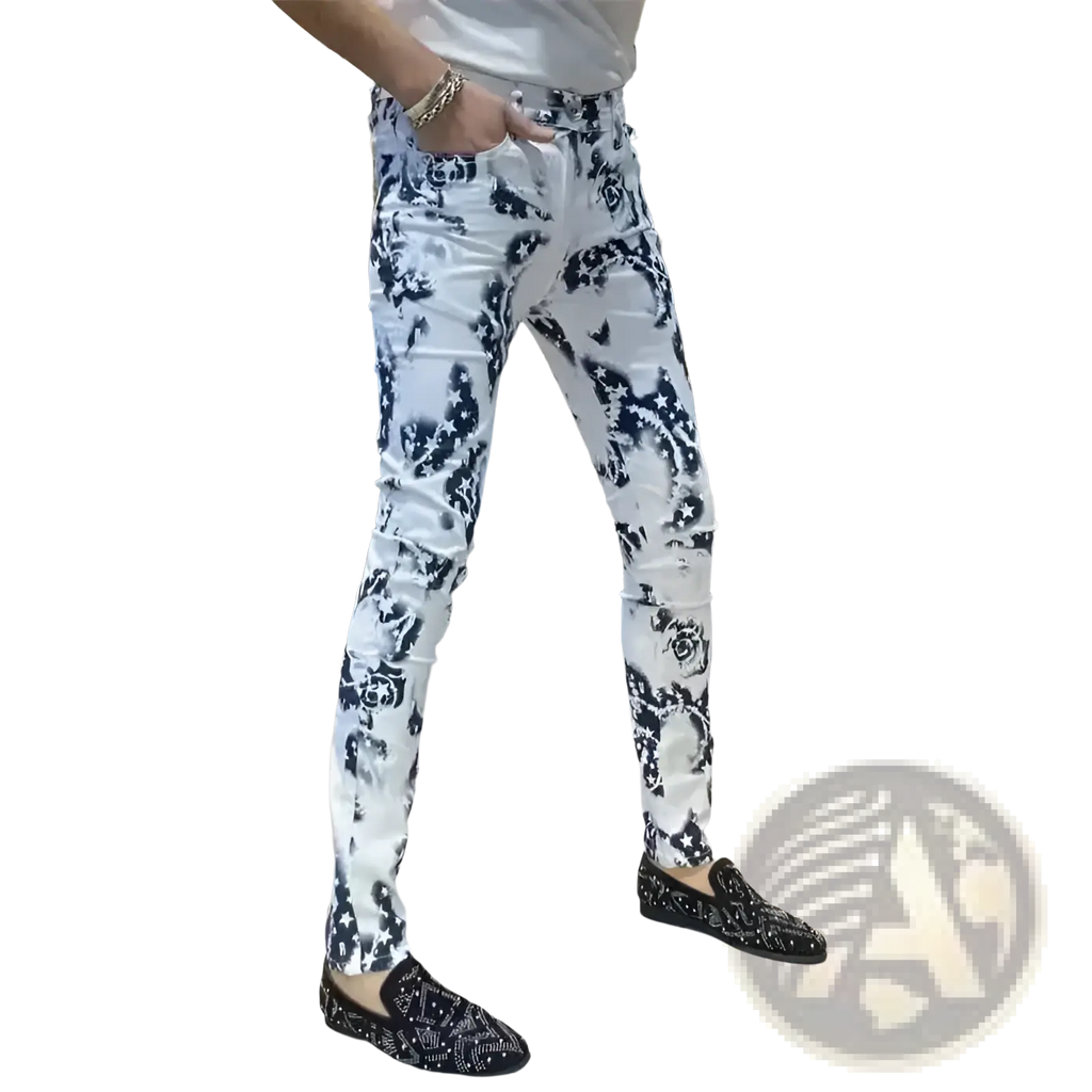 Men black floral slim fit jeans in white skinny style with black floral and skull pattern and distressed details