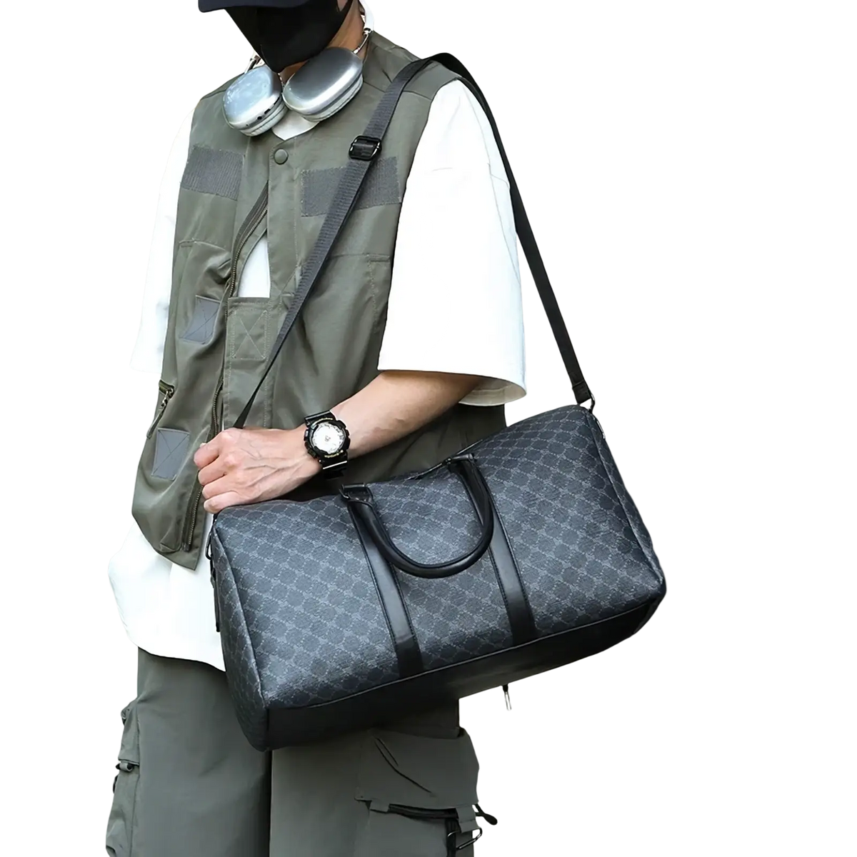 Men black Gucci GG patterned travel duffel bag with dark gray GG Supreme fabric and black leather trim and handles