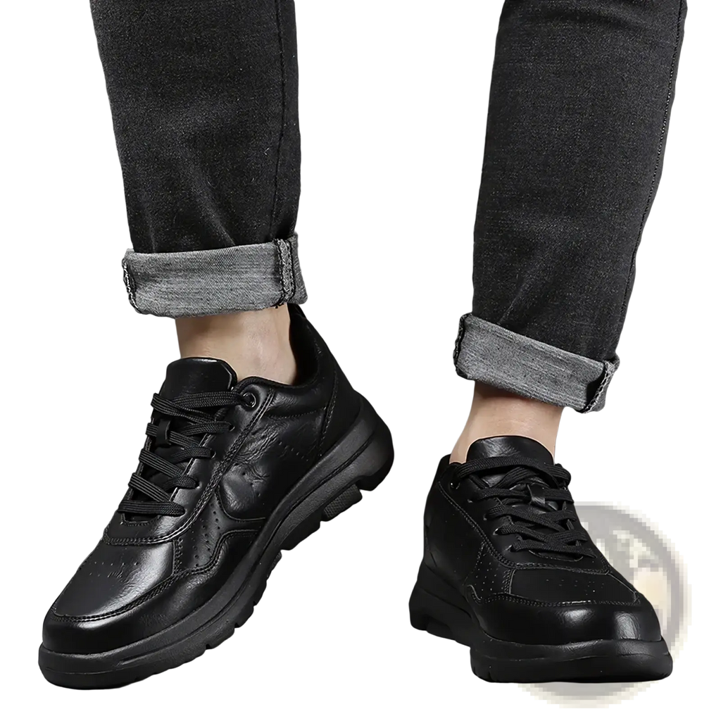 Men black leather chunky sole sneakers featuring a black leather upper with a chunky sole and subtle perforated detailing