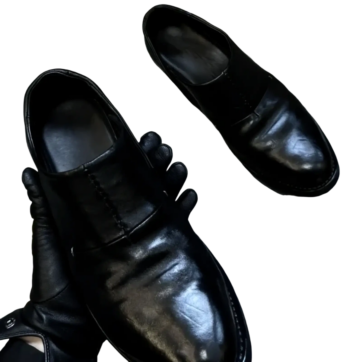 Men black leather vintage slip on dress shoes with a polished finish and detailed visible stitching
