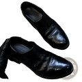 Men black leather vintage slip on dress shoes with polished finish and subtle stitching details for formal wear
