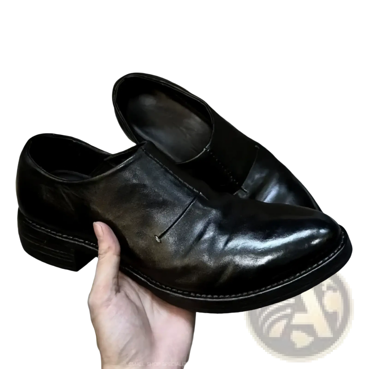 Men black leather vintage slip on dress shoes with polished finish and visible stitching