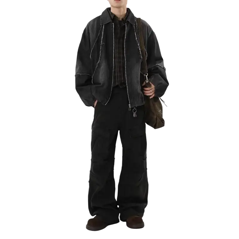 Men black niche bomber jacket in distressed denim with raw hem and zipper detailing showcasing design sense niche