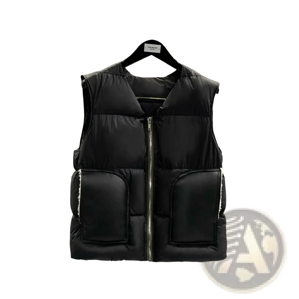 Men black quilted puffer vest with front zipper and fleece lined patch pockets for winter outerwear