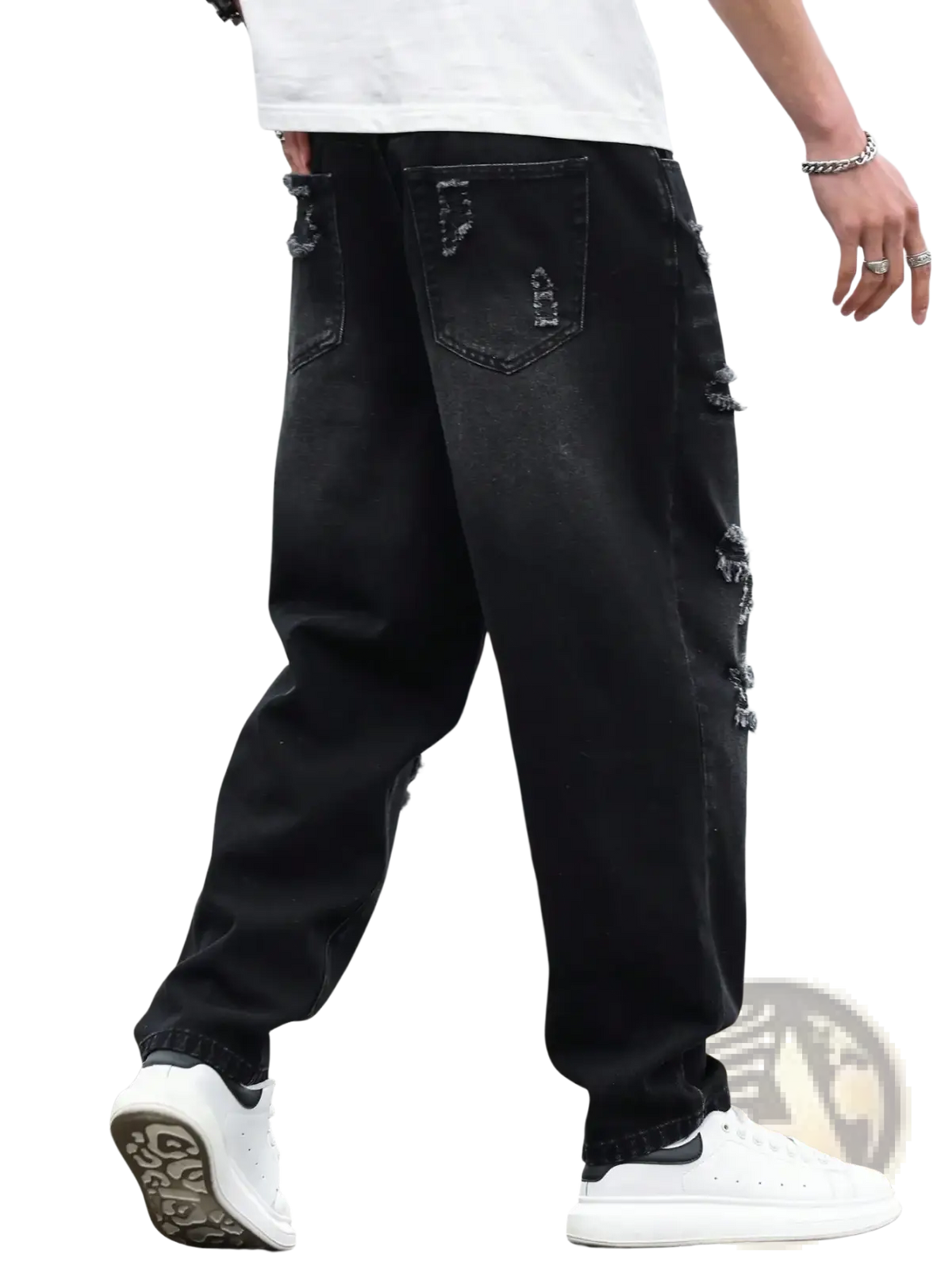 Men black ripped denim harem pants featuring distressed details and a relaxed fit in cotton denim material