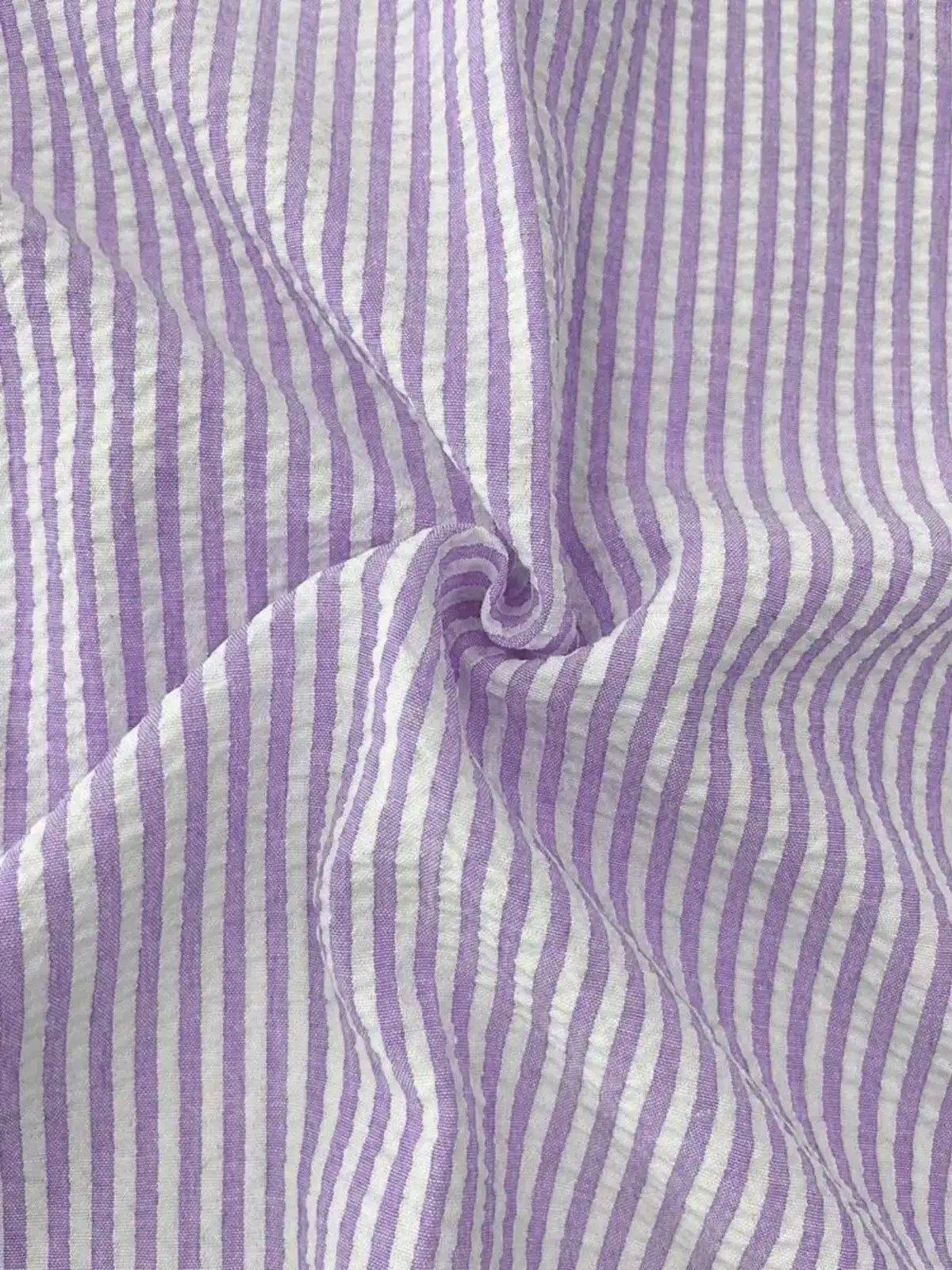 Men blue striped long sleeve casual button down shirt in purple and white vertically striped cotton fabric with crinkled texture
