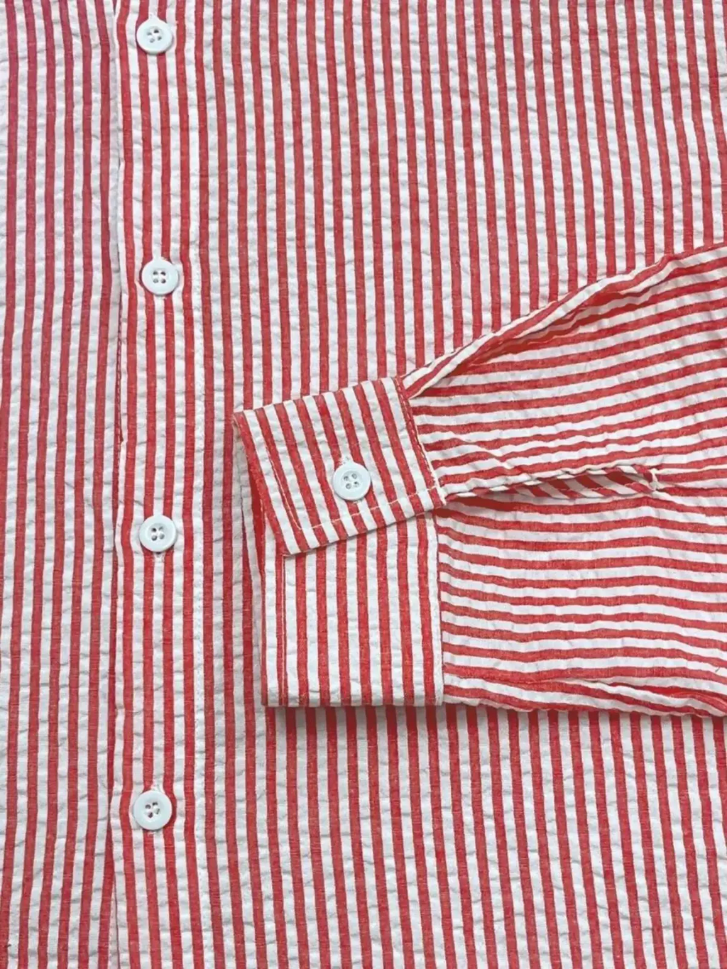 Men blue striped long sleeve casual button down shirt with red and white vertical stripes and lightweight textured fabric
