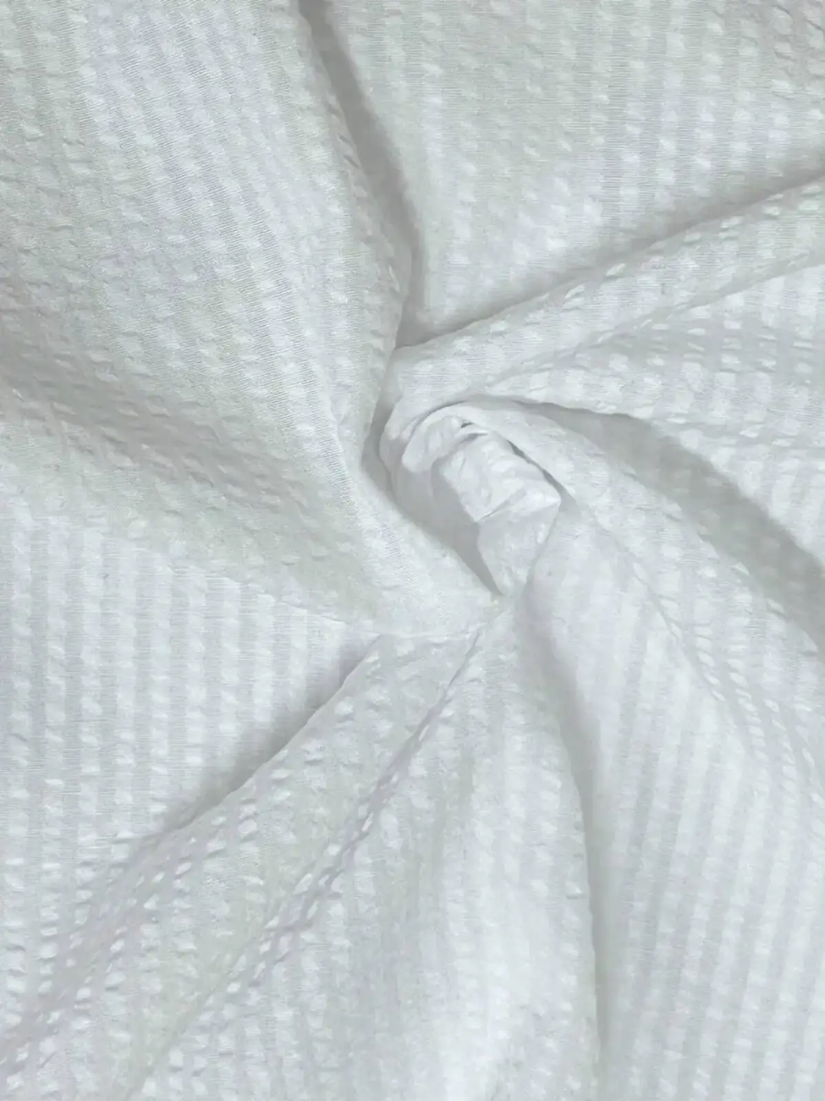 Men blue striped long sleeve casual button down shirt made of white waffle-weave cotton fabric with textured grid pattern
