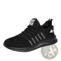 Men breathable casual knit sneaker in black with white geometric patterns and a textured rubber sole