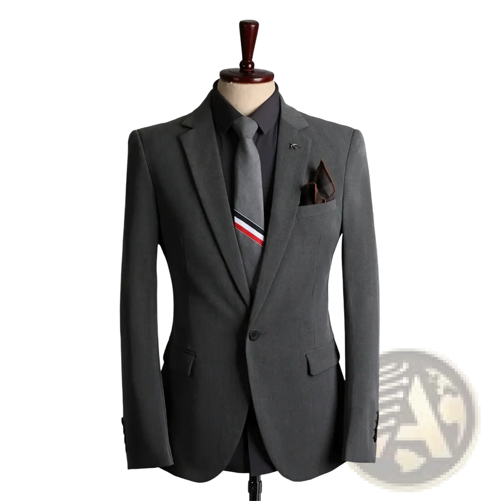 Gray tailored men business casual suit blazer with subtle textured weave paired with charcoal shirt and striped tie