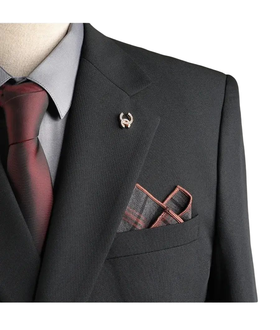 A sleek metallic pin with a stylized horn on the lapel of a dark men business suit slim fit 3 piece set for casual party