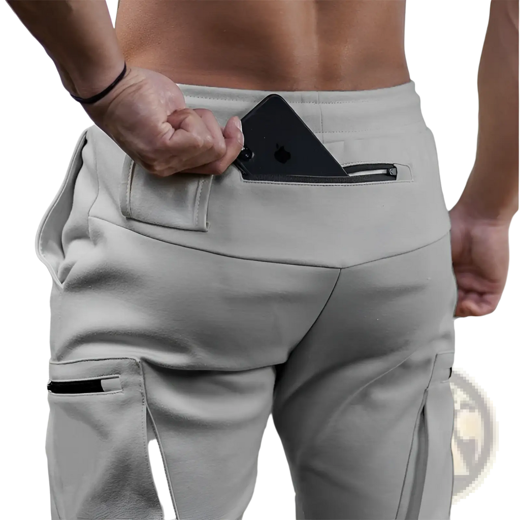 Men camouflage cargo joggers in light gray with black zipper pockets featuring a sleek athletic design