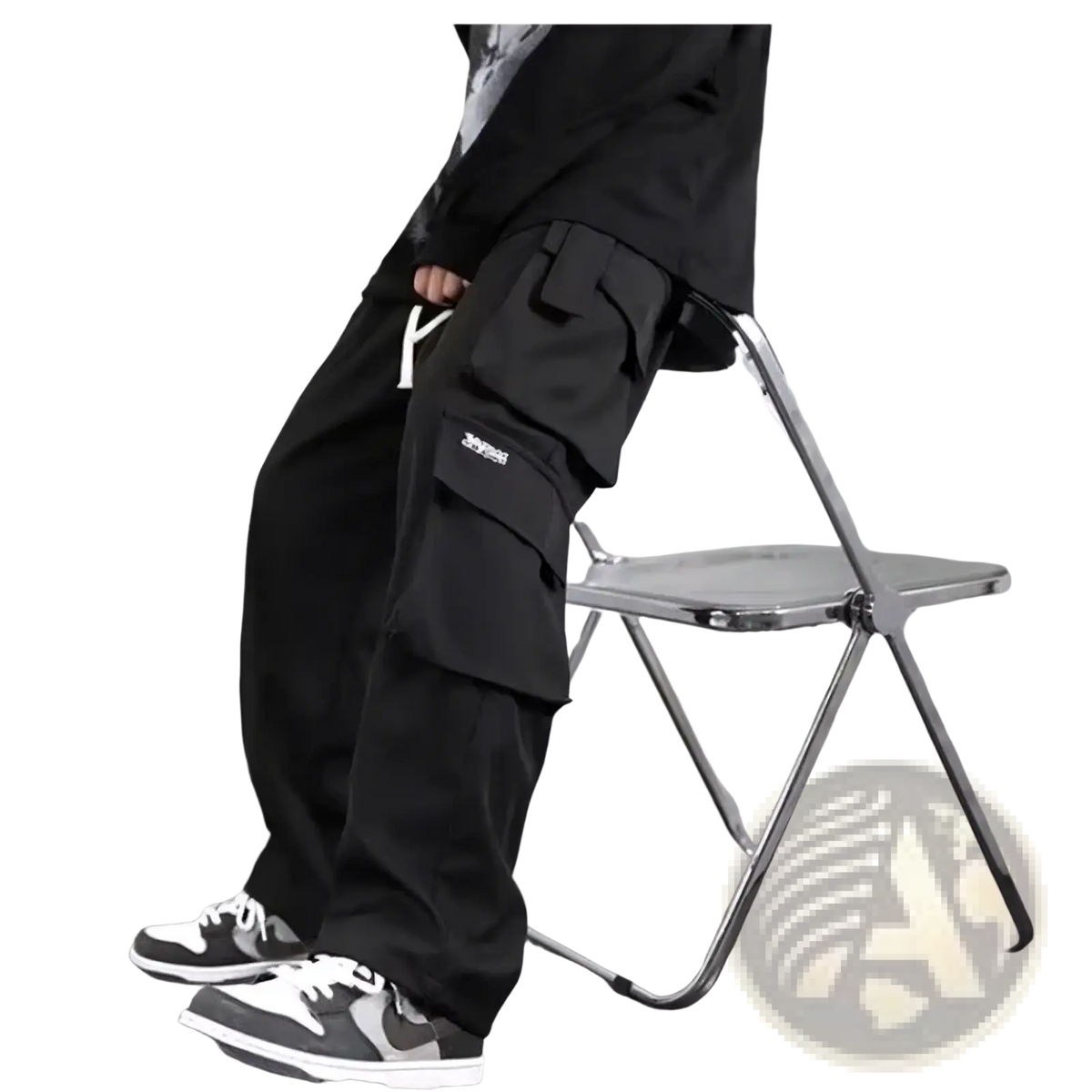 Men cargo joggers loose fit track pants in black with multiple pockets and a subtle white logo on the thigh