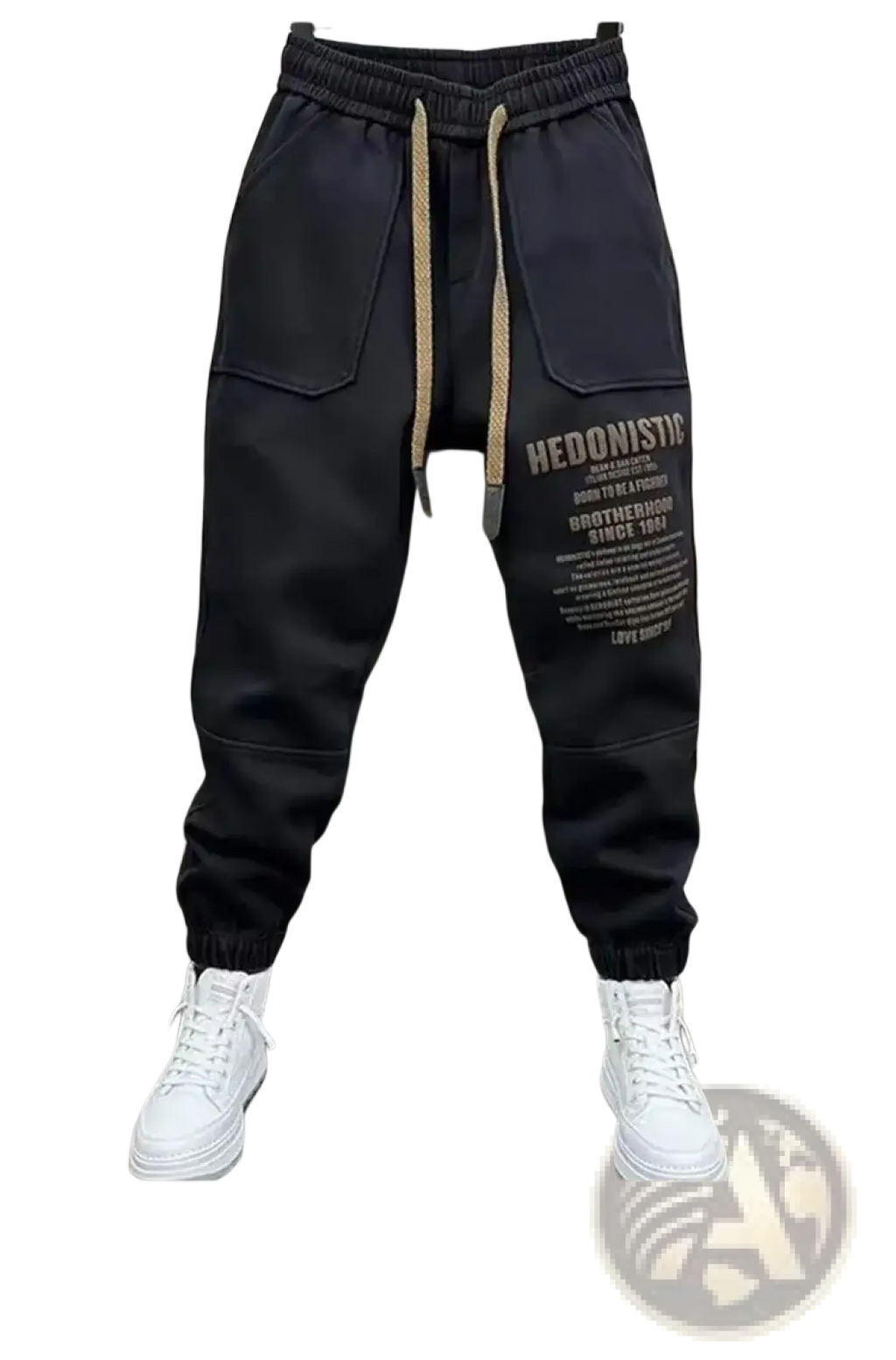 Men cargo joggers streetwear pants in black with beige drawstrings and bold white text graphic on the left leg