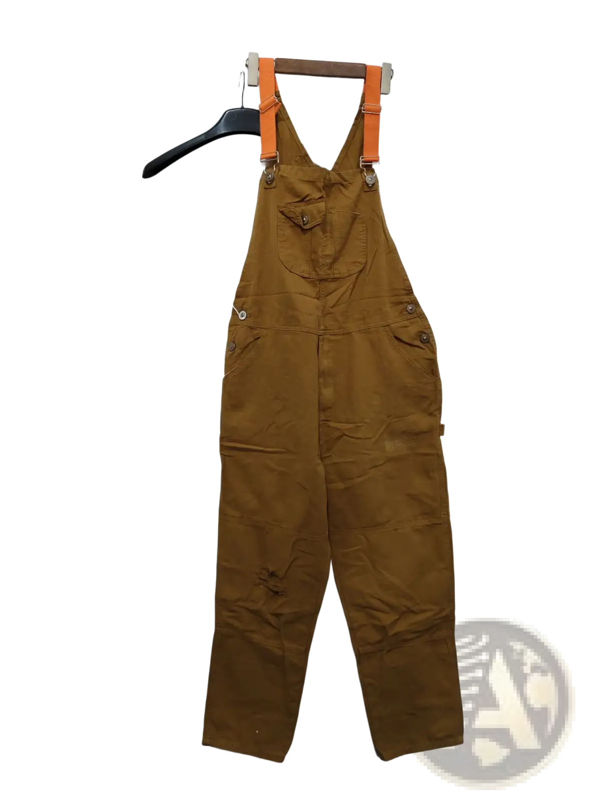 Men cargo suspender jumpsuit made of brown canvas with orange suspenders hanging on a wooden hanger