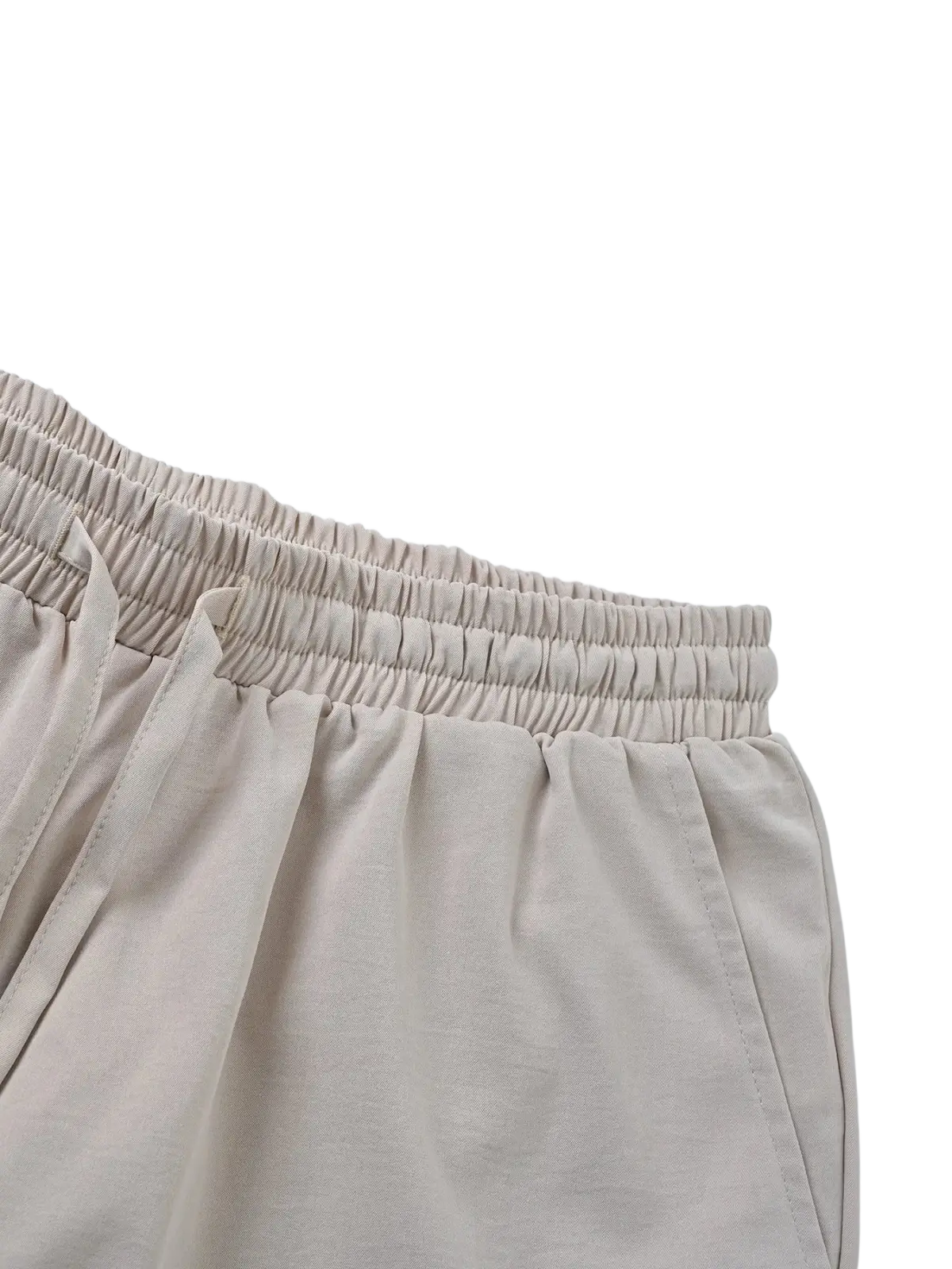 Beige elastic-waist trousers with soft lightweight fabric and subtle stitching in men casual summer outfit set