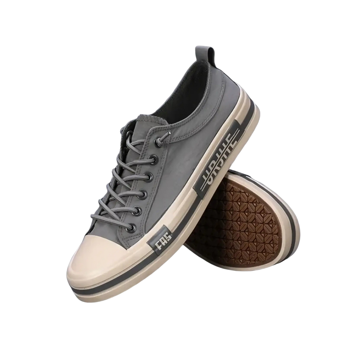 Gray canvas low-top men casual sneakers with white rubber toe cap sole and black branding for lightweight summer use