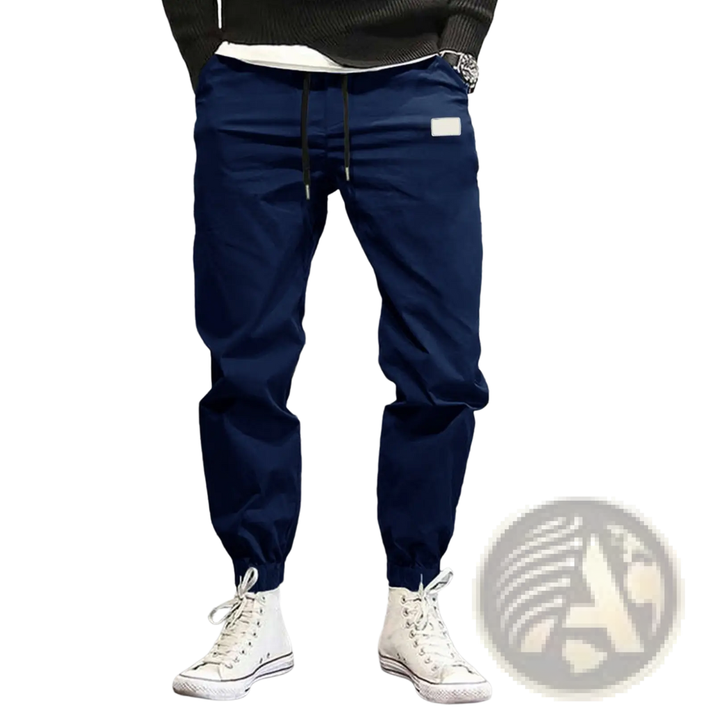 Navy blue men casual jogger pants with quick dry fabric tapered fit and white rectangular patch on thigh