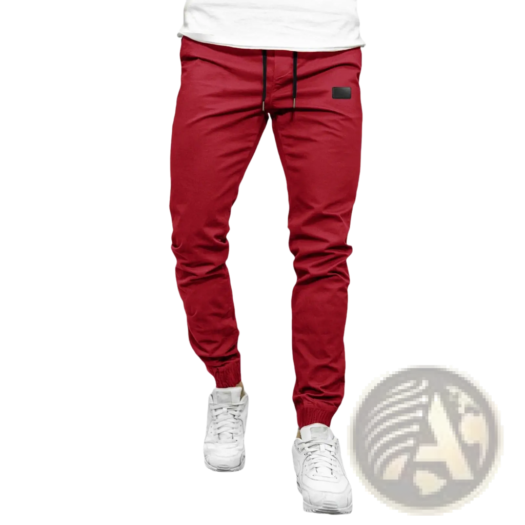 Men casual jogger pants in red with black drawstring and small black thigh patch quick dry tapered trousers