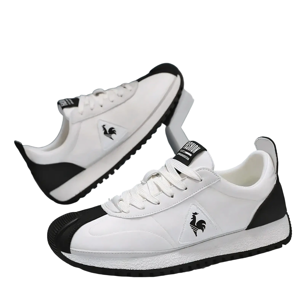 Men casual leather sneakers by le coq sportif in white and black with sleek contrasting panels and rooster logo for sports training