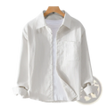 Men casual long sleeve white ribbed cotton shirt with classic collar and chest pocket displayed on wooden hanger